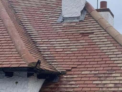 this is a photo of a roof that needs repair in New Romney